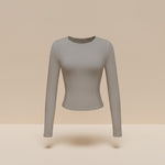 Yemelia grey long sleeve fitted crop top with thumbhole cuffs and crew neck, made from soft stretchy fabric.