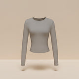 Yemelia grey long sleeve fitted crop top with thumbhole cuffs and crew neck, made from soft stretchy fabric.