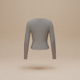 Yemelia grey long sleeve fitted crop top with thumbhole cuffs and a clean neckline, made from soft stretch fabric.