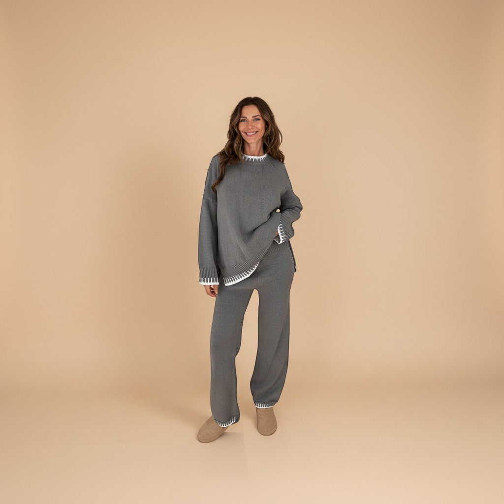Yemelia grey knit lounge set with crew neck sweater and wide-leg pants, featuring contrast white trim.