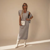Yemelia grey knit turtleneck sweater and midi skirt set with relaxed fit and fitted silhouette.