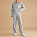 Yemelia grey ribbed knit hoodie set with relaxed-fit pants, featuring a casual hood and straight-leg design.