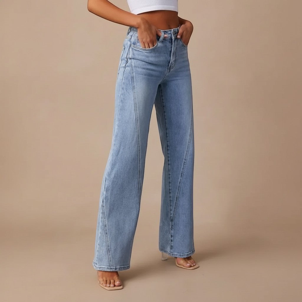 Yemelia light wash denim high waist straight leg jeans with five-pocket design and seam detailing.