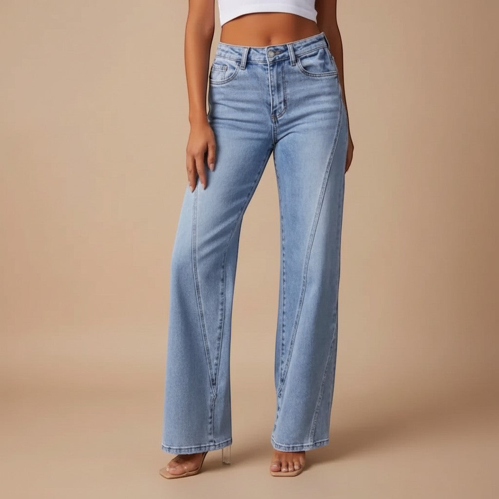 Yemelia light wash denim jeans with high waist, straight leg, and five-pocket design.
