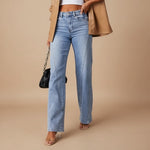 Yemelia light wash denim jeans with a high waist, straight leg, and classic five-pocket design.