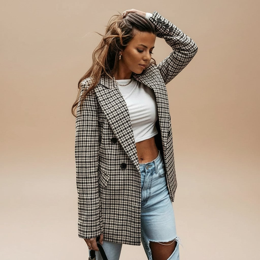 Yemelia double-breasted houndstooth blazer jacket with notched lapels and button closure.