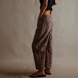 Yemelia brown leopard print wide leg denim jeans with relaxed fit and mid-rise waist.