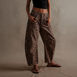 Yemelia brown leopard print wide leg denim jeans with relaxed fit and mid-rise waist.