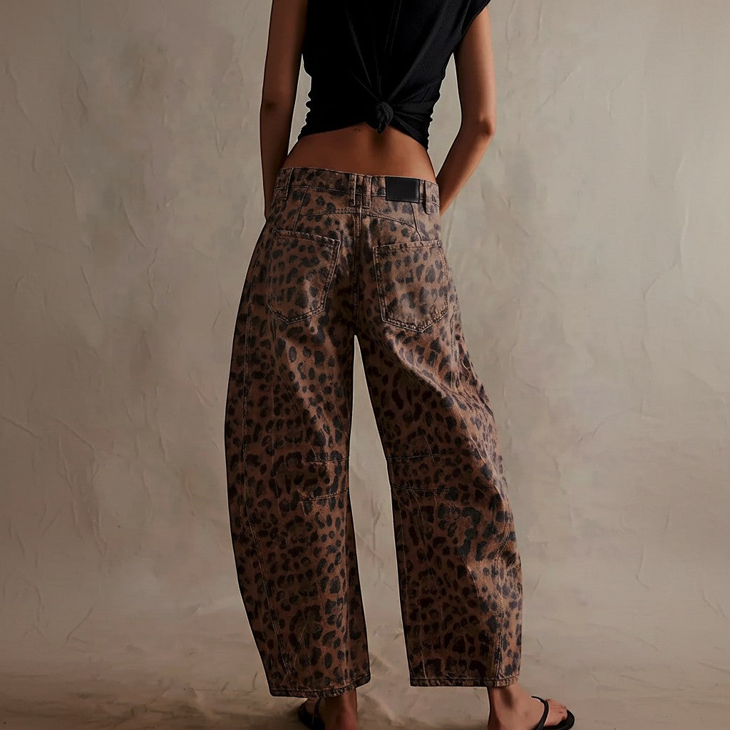 Yemelia brown leopard print wide leg denim jeans with relaxed fit and mid-rise waist.