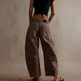 Yemelia brown leopard print wide leg denim jeans with relaxed fit and mid-rise waist.