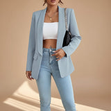 Yemelia light blue open front tailored blazer with slim fit and functional pockets.