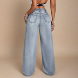 Yemelia light wash denim jeans with a mid-rise waist and relaxed straight leg silhouette. Features five-pocket design.