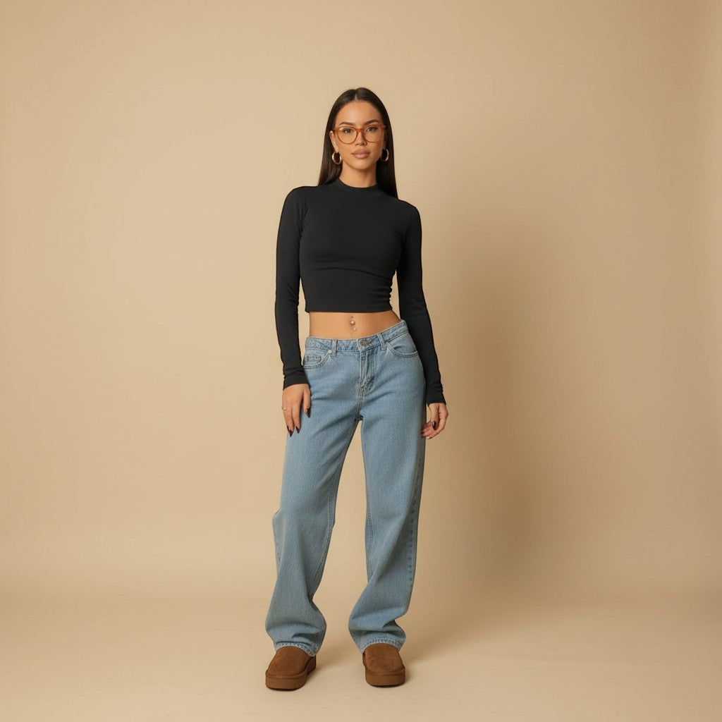 Yemelia light wash mid rise wide leg denim jeans with a relaxed fit and five-pocket design.