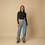 Yemelia light wash mid rise wide leg denim jeans with a relaxed fit and five-pocket design.