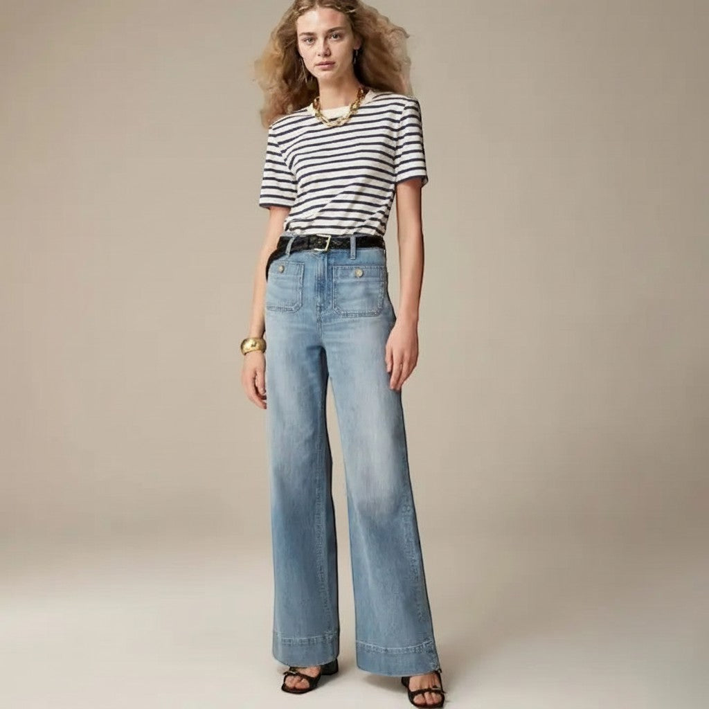 Yemelia light wash denim wide leg pants with high waist and utility pockets.