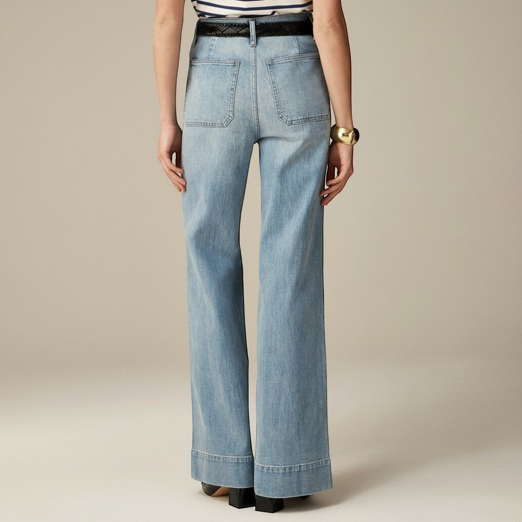 Yemelia light wash denim wide leg pants with utility pockets and high waist.