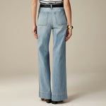 Yemelia light wash denim wide leg pants with utility pockets and high waist.