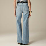 Yemelia light wash denim wide leg pants with utility pockets and high waist.