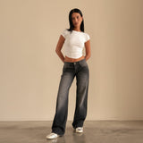 Yemelia mid rise wide leg denim jeans in a faded black wash with a relaxed fit and five-pocket design.