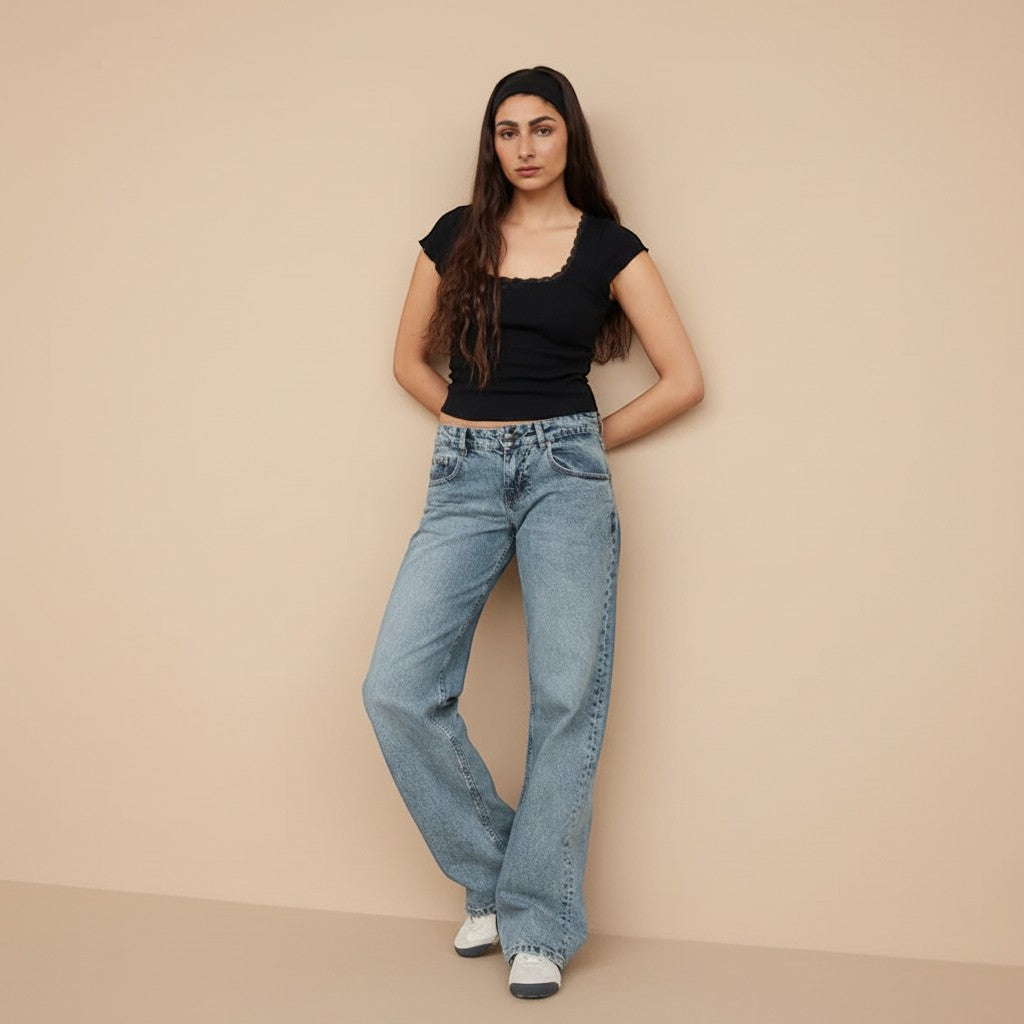 Yemelia mid rise wide leg denim jeans in light blue wash, relaxed fit, classic five-pocket design.