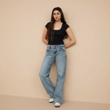 Yemelia mid rise wide leg denim jeans in light blue wash, relaxed fit, classic five-pocket design.
