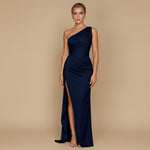 Yemelia navy blue one shoulder draped evening gown with high slit and floor-length silhouette.