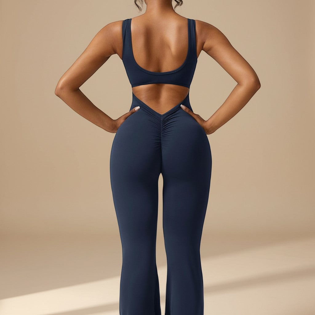 Yemelia navy blue sleeveless sculpting flared leg jumpsuit with ruched detail on the back.