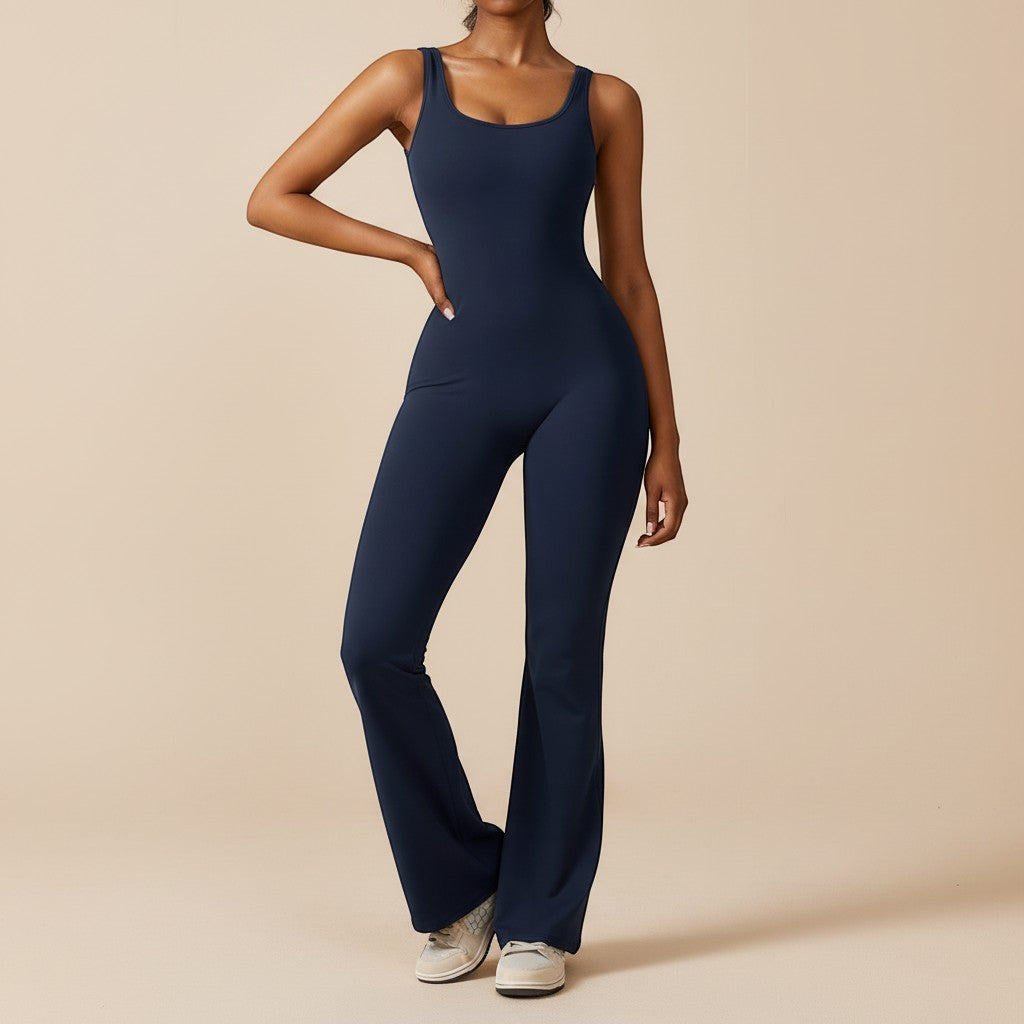 Yemelia navy blue sleeveless sculpting flared leg jumpsuit made of smooth stretch fabric.