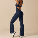 Yemelia navy blue sleeveless sculpting flared leg jumpsuit with a ruched back detail and clean neckline.
