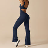 Yemelia navy blue sleeveless sculpting flared leg jumpsuit with a ruched back detail and clean neckline.