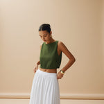 Yemelia sleeveless olive green textured knit crop top with clean neckline and structured fit.