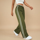 Yemelia olive green high waist wide leg track pants with white side stripes and elasticated drawstring waist.