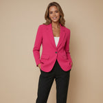 Yemelia bright pink single-button tailored blazer with structured fit, lapel neckline, and flap pockets.