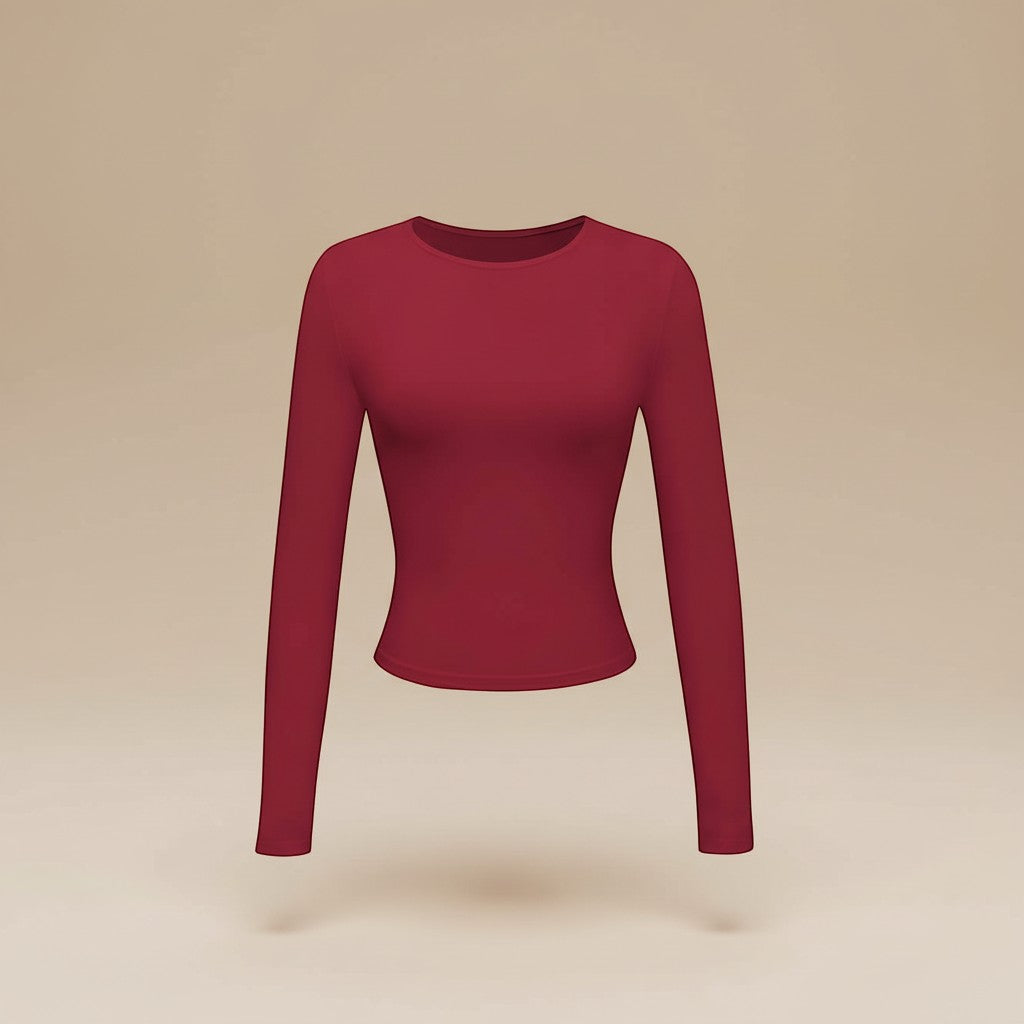Yemelia long sleeve fitted crop top in deep red, made from soft stretch fabric with thumbhole cuffs.