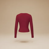 Yemelia long sleeve fitted crop top in deep red, made from soft stretch fabric with thumbhole cuffs.