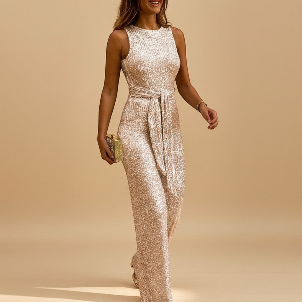 Yemelia sleeveless rose gold sequin wide leg jumpsuit with waist tie, perfect for evening events.