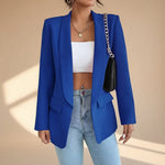 Yemelia royal blue open front tailored blazer with slim fit and front pockets. Smooth structured fabric.