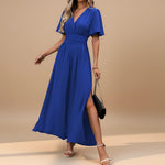 Yemelia royal blue V neck flutter sleeve maxi dress with defined waist and side slit.