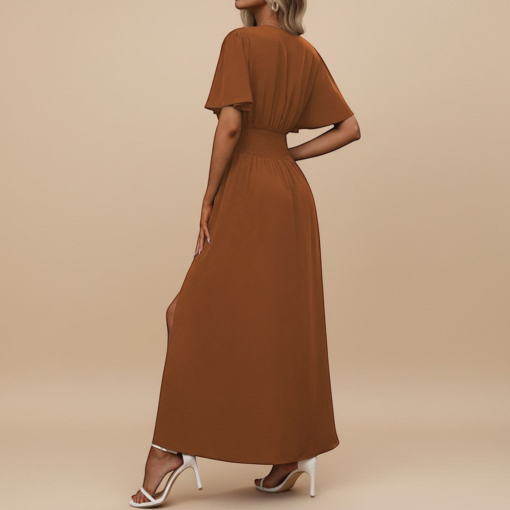Yemelia rust orange V neck flutter sleeve maxi dress with defined waist and side slit.