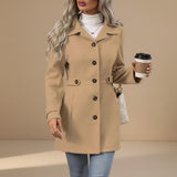 Yemelia tan tailored mid-length coat with button front, classic collar, and waist belt. Made from a structured fabric.
