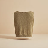 Yemelia sleeveless textured crop top in a warm tan color with a clean neckline and ribbed hem.