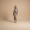 Yemelia taupe knit turtleneck sweater and midi skirt set. Relaxed fit sweater, fitted skirt, soft knit fabric.