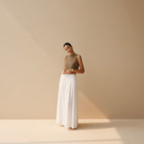 Yemelia sleeveless taupe textured knit crop top with a clean neckline and structured fit.