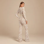 Yemelia white lace sequin jumpsuit with structured waist and wide legs, ideal for formal events.