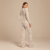 Yemelia white lace sequin jumpsuit with structured waist and wide legs, ideal for formal events.
