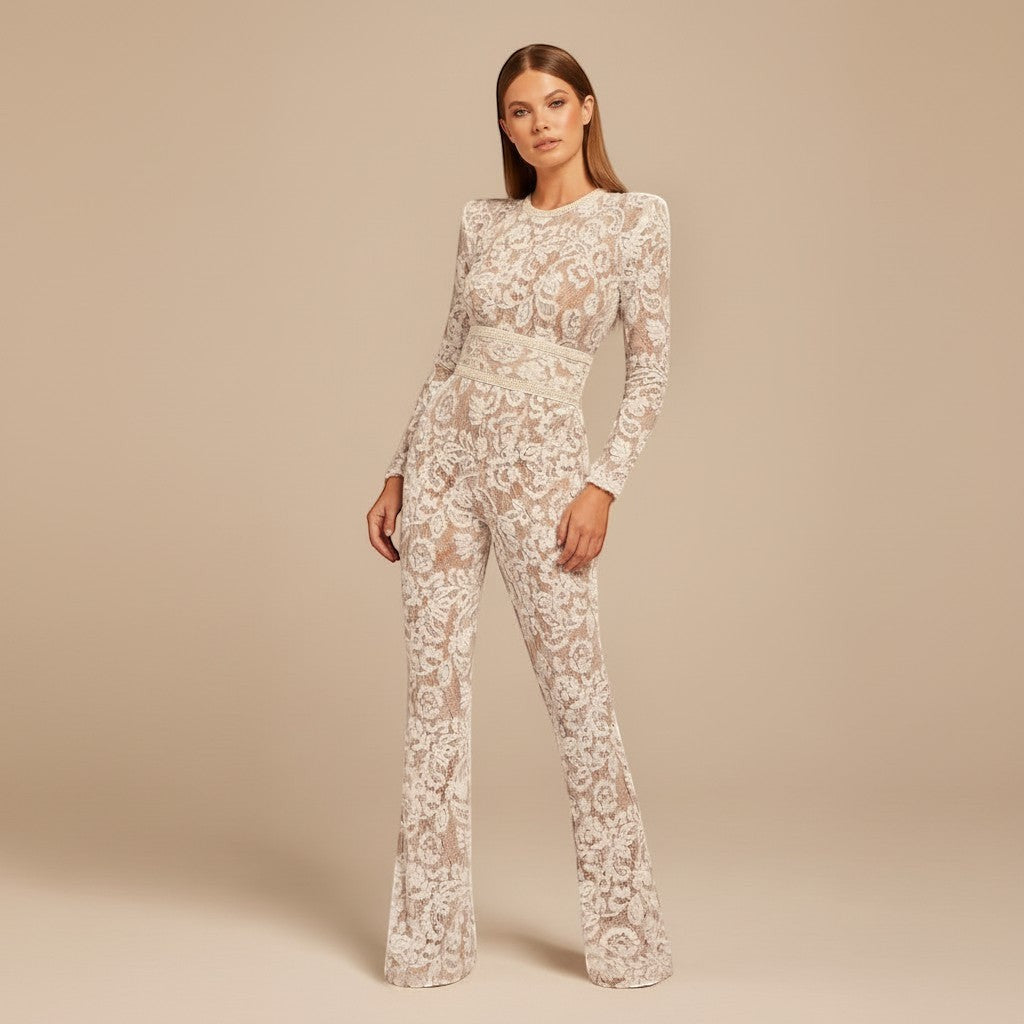 Yemelia white lace sequin jumpsuit with long sleeves, structured waist, and wide legs. Ideal for formal events.