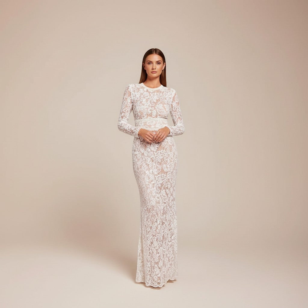 Yemelia white lace sequin jumpsuit with long sleeves, structured waist, and wide legs. Ideal for formal events.