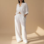 Yemelia white relaxed fit button-down shirt and wide-leg pants set, lightweight textured fabric, drawstring waist.