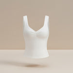 Yemelia white fitted sleeveless top with ruched bust and square neckline. Stretch fabric.