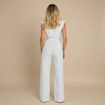 Yemelia white sleeveless wide leg jumpsuit with waist tie, ideal for events and workwear.